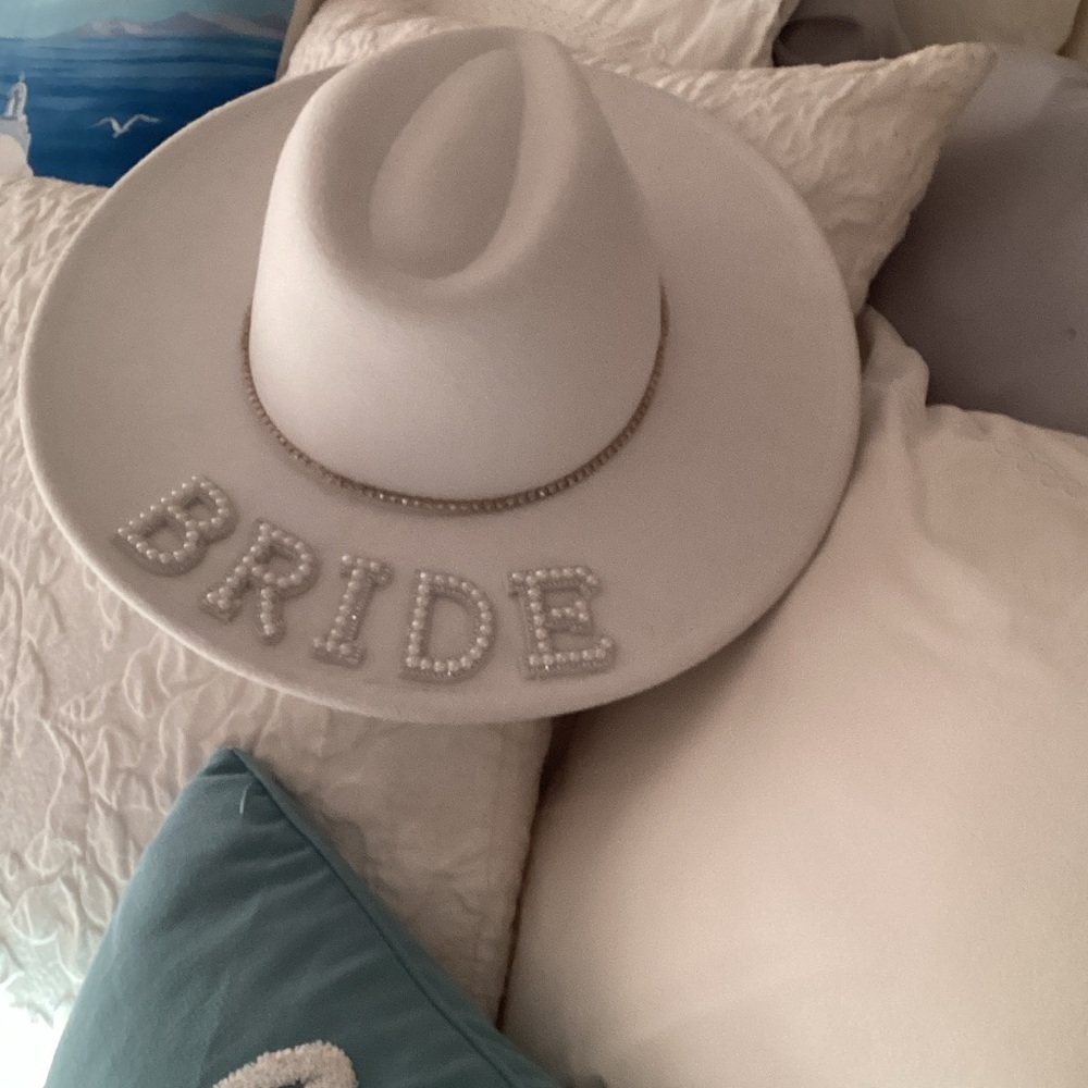 White felt Bride Hat with Pearl Details and rhinestone trim.